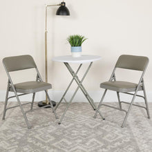 Load image into Gallery viewer, HERCULES Series Curved Triple Braced & Double Hinged Gray Vinyl Metal Folding Chair