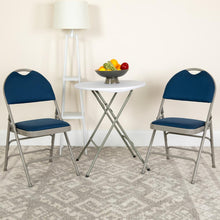 Load image into Gallery viewer, HERCULES Series Ultra-Premium Triple Braced Navy Fabric Metal Folding Chair with Easy-Carry Handle