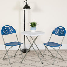 Load image into Gallery viewer, HERCULES Series 650 lb. Capacity Blue Plastic Fan Back Folding Chair