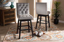 Load image into Gallery viewer, Baxton Studio Gregory Modern Transitional Light Grey Velvet Fabric Upholstered and Dark Brown Finished Wood 2-Piece Swivel Bar Stool Set Set