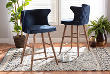 Load image into Gallery viewer, Baxton Studio Sagira Modern and Contemporary Transitional Navy Blue Velvet Fabric Upholstered and Walnut Brown Finished Wood 2-Piece Counter Stool Set