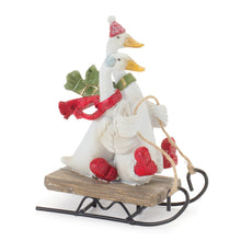 Load image into Gallery viewer, Sledding Holiday Goose Figurine (Set of 4)