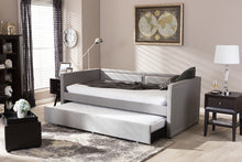 Load image into Gallery viewer, Baxton Studio Raymond Modern and Contemporary Grey Fabric Nail Heads Trimmed Sofa Twin Daybed with Roll-Out Trundle Guest Bed