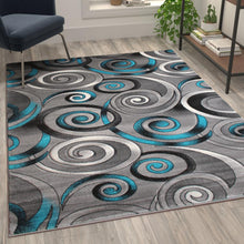 Load image into Gallery viewer, 5' x 7' Turquoise Swirl Olefin Area Rug with Jute Backing
