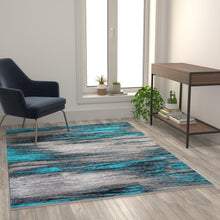 Load image into Gallery viewer, 5' x 7' Turquoise Scraped Design Area Rug - Olefin Rug with Jute Backing
