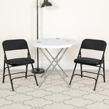 Load image into Gallery viewer, HERCULES Series Curved Triple Braced &amp; Double Hinged Black Patterned Fabric Metal Folding Chair
