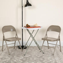 Load image into Gallery viewer, HERCULES Series Double Braced Gray Metal Folding Chair

