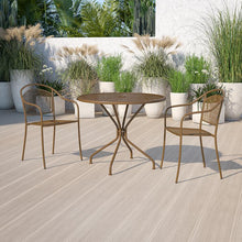Load image into Gallery viewer, 35.25" Round Gold Indoor-Outdoor Steel Patio Table with Umbrella Hole
