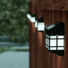 Load image into Gallery viewer, Holder 6 Pack Wall Mount LED Solar Lights - Weather Resistant Black
