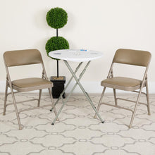 Load image into Gallery viewer, HERCULES Series Curved Triple Braced &amp; Double Hinged Beige Vinyl Metal Folding Chair
