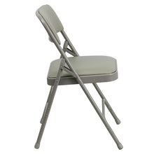 Load image into Gallery viewer, HERCULES Series Curved Triple Braced &amp; Double Hinged Gray Vinyl Metal Folding Chair
