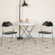 Load image into Gallery viewer, HERCULES Series Black Vinyl Metal Folding Chair with Carrying Handle
