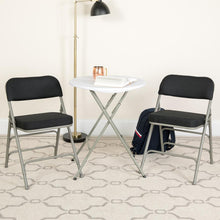 Load image into Gallery viewer, 2 Pack Triple Braced &amp; Double Hinged Black Pin-Dot Fabric Metal Folding Chair
