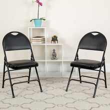 Load image into Gallery viewer, 2 Pack HERCULES Series Ultra-Premium Triple Braced Black Vinyl Metal Folding Chair with Easy-Carry Handle
