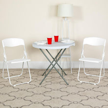 Load image into Gallery viewer, 2 Pack 500 lb. Capacity Heavy Duty White Plastic Folding Chair
