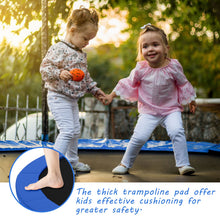 Load image into Gallery viewer, Two children holding hands on a trampoline with safety padding, surrounded by greenery.
