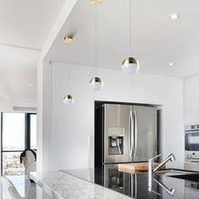 Load image into Gallery viewer, Integrated LED Height Adjustable Pendant Light with Globe Shade in Brass
