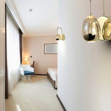 Load image into Gallery viewer, Integrated LED Wall Sconce Light with Champagne Glass Shade in Gold
