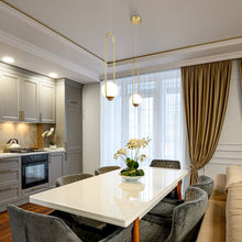 Load image into Gallery viewer, Integrated LED Height Adjustable Pendant Light in Antique Brass with Glass Shade

