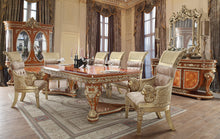 Load image into Gallery viewer, Luxurious dining room with ornate furniture and decor
