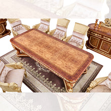 Load image into Gallery viewer, Decorative wooden table with gold accents in a formal setting

