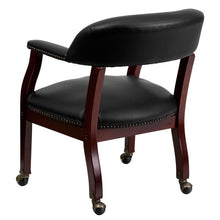 Load image into Gallery viewer, Black Vinyl Luxurious Conference Chair with Accent Nail Trim and Casters
