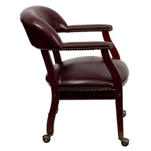 Load image into Gallery viewer, Oxblood Vinyl Luxurious Conference Chair with Accent Nail Trim and Casters
