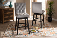 Load image into Gallery viewer, Baxton Studio Gregory Modern Transitional Light Grey Velvet Fabric Upholstered and Dark Brown Finished Wood 2-Piece Swivel Bar Stool Set Set
