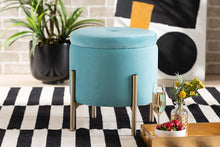 Load image into Gallery viewer, Baxton Studio Malina Contemporary Glam and Luxe Sky Blue Velvet Fabric Upholstered and Gold Finished Metal Storage Ottoman
