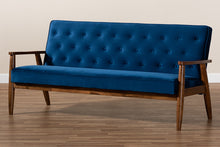 Load image into Gallery viewer, Baxton Studio Sorrento Mid-century Modern Navy Blue Velvet Fabric Upholstered Walnut Finished Wooden 3-seater Sofa
