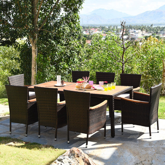 9 Pieces Patio Rattan Dining Set with Stackable Chairs Cushioned and Acacia Wood Table Top